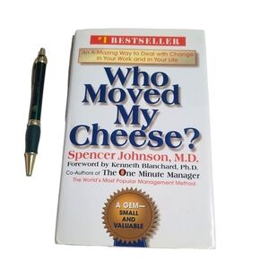 WHO MOVED MY CHEESE By Spencer Johnson M.D.